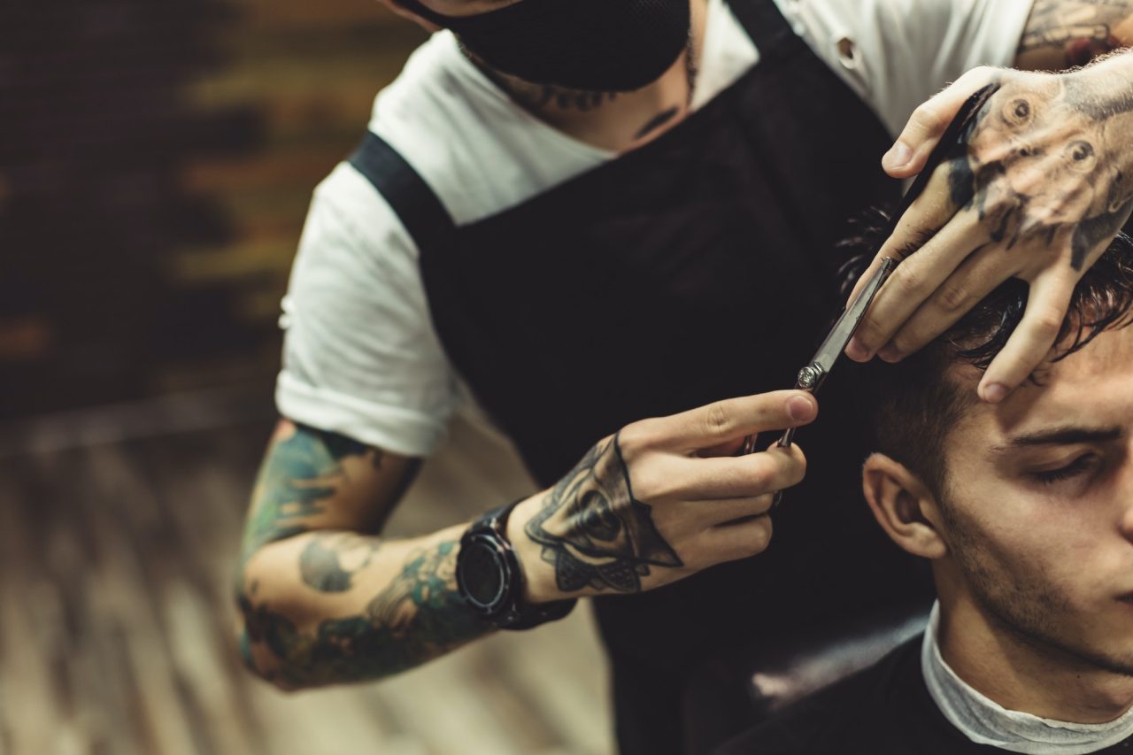 crop-barber-doing-haircut-for-client-1.jpg