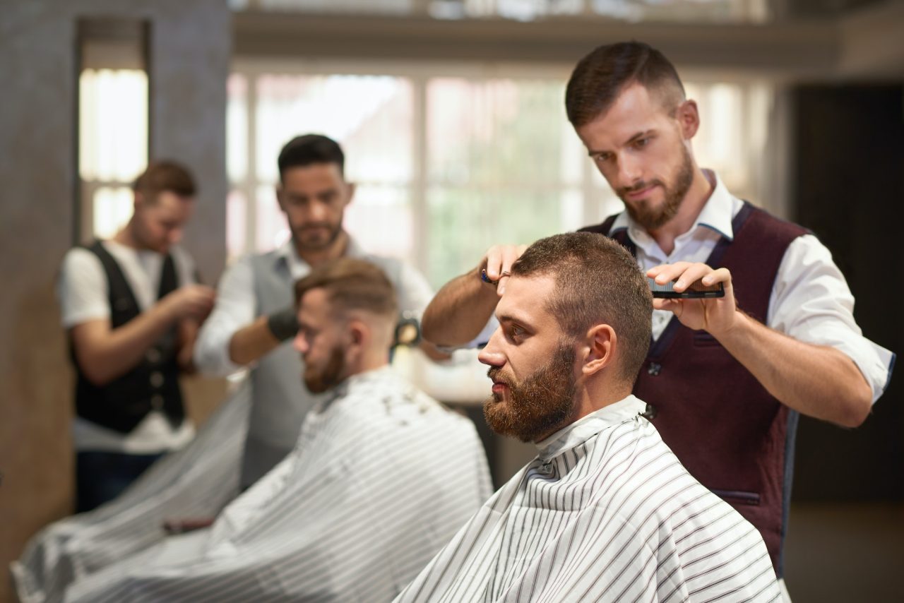 side-view-of-process-of-hairstyling-in-barber-shop.jpg